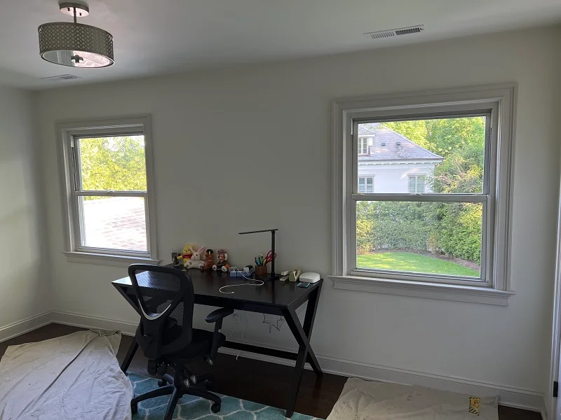 Aluminum windows updated to black Andersen Woodwright windows